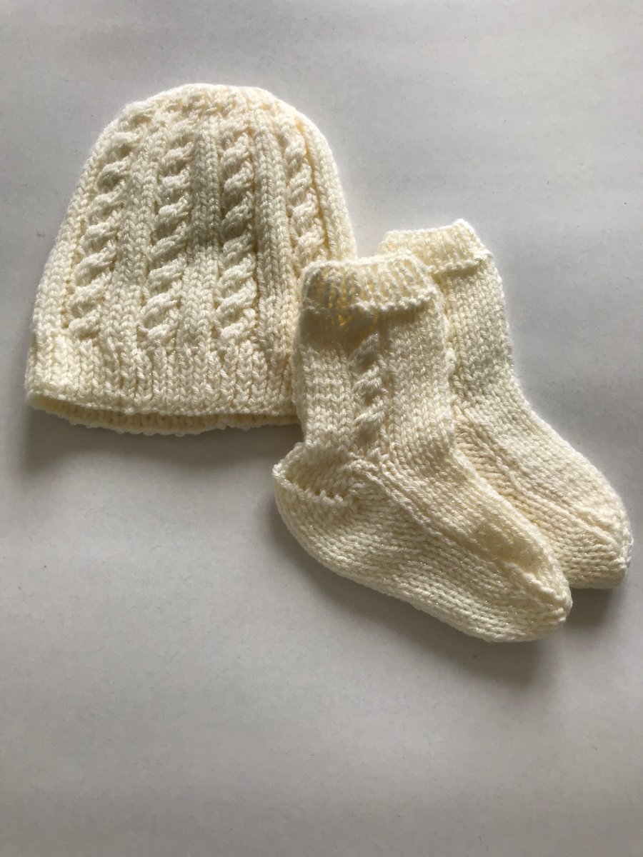 Hand knitted baby sparkly hat and socks