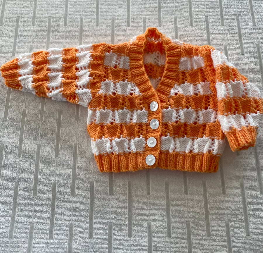 Baby cardigan with patterned stripes