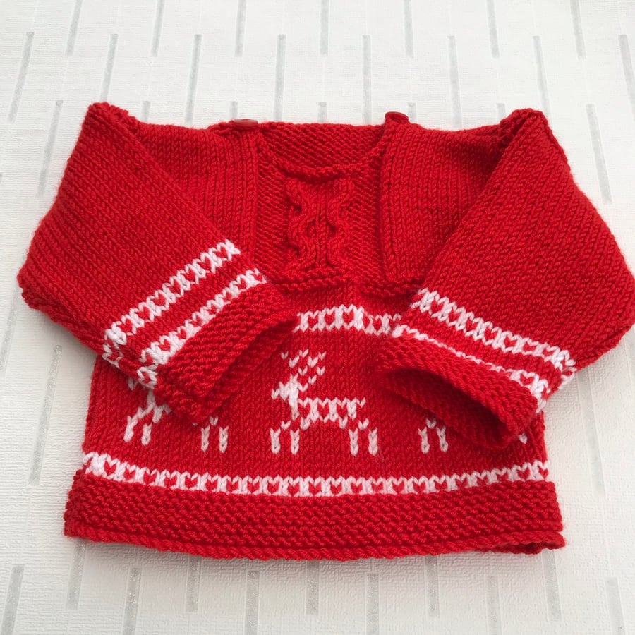 Red jumper with fair isle deer detail