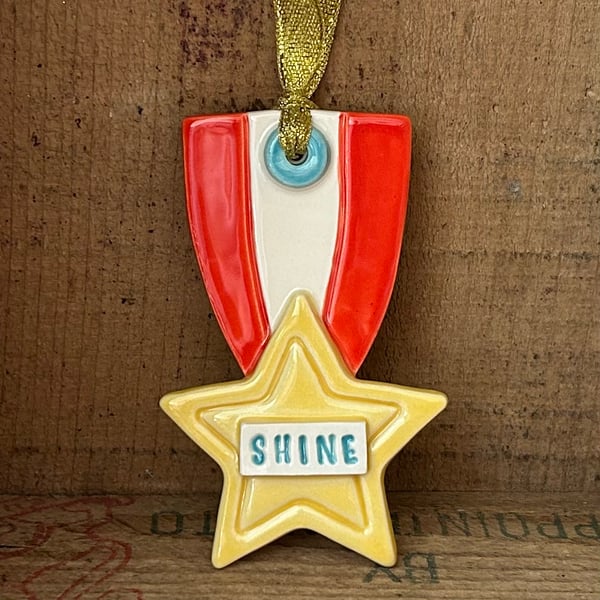 Ceramic Star medal decoration 