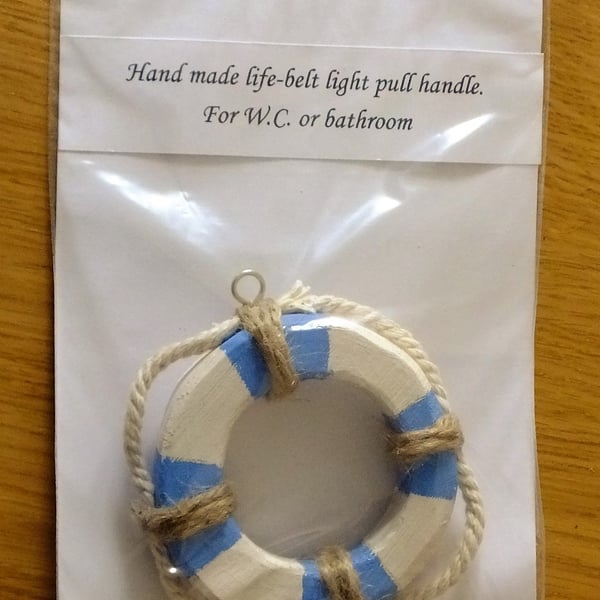 Lifebelt shaped bathroom light or lamp pull handle for mariner or sailor  