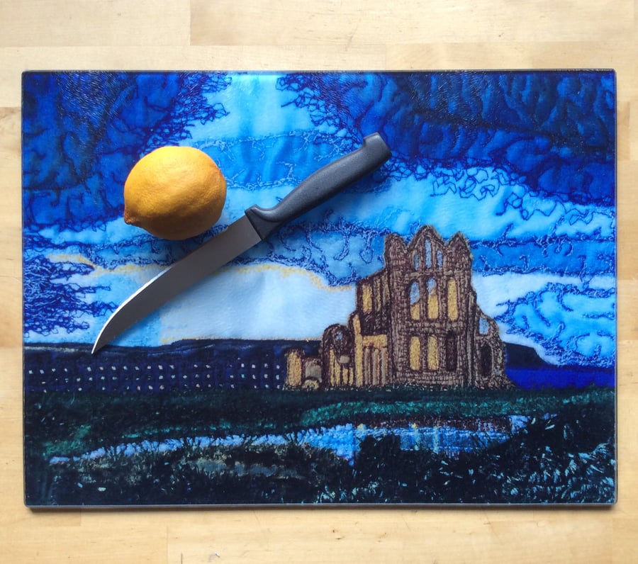 Glass chopping board, bread board or work top saver.