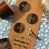 Set of 3 handcrafted ceramic buttons in speckled brown and rutile blue