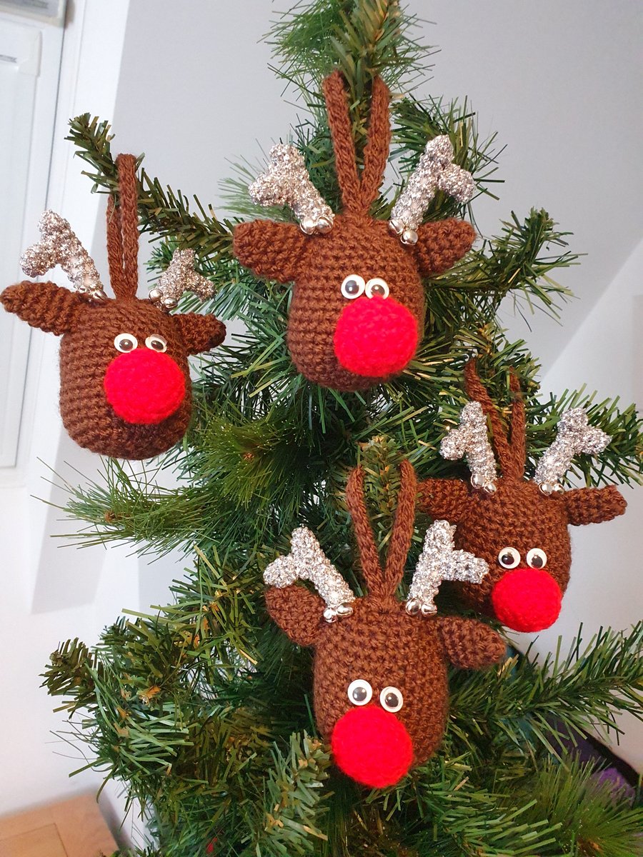 Crocheted reindeer decoration with silver antlers