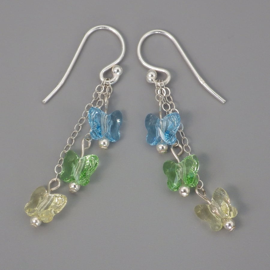 Three tier blue, green, and yellow Swarovski butterfly bead earrings