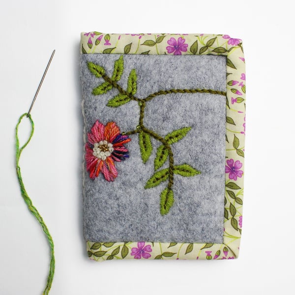 Grey felt needle case with dog rose embroidery