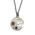 rose cut carnelian and iolite on roller printed sterling silver disc pendant