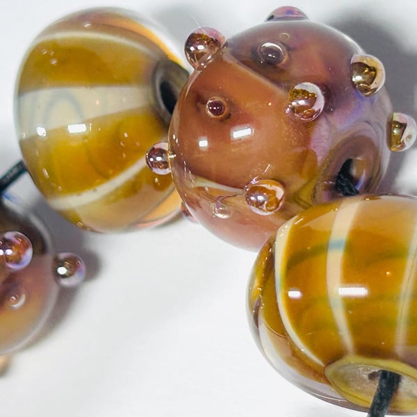Handmade brown lamp work glass beads
