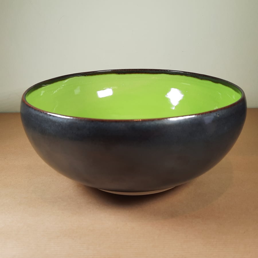 Large lime green and black ceramic salad bowl
