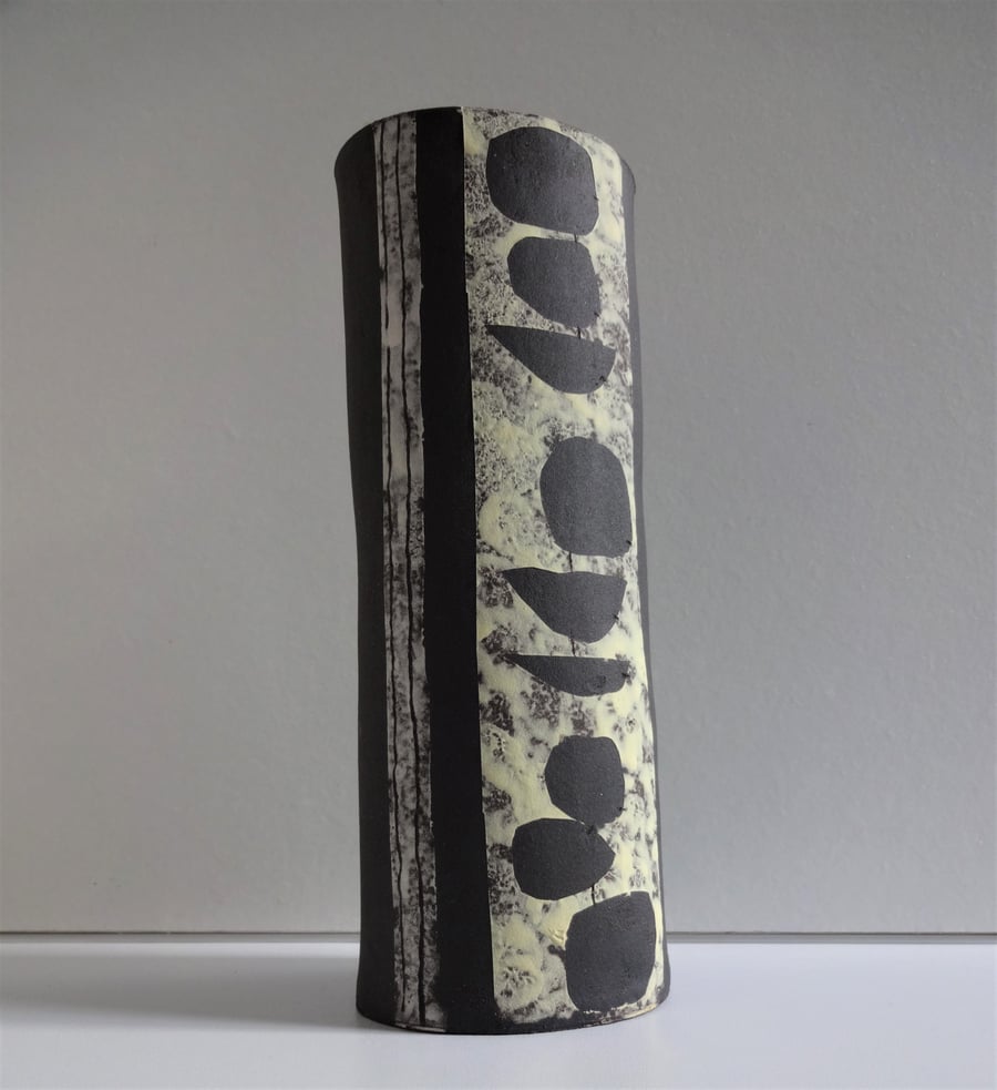 Gussie.  Black, lemon yellow and grey ceramic vase