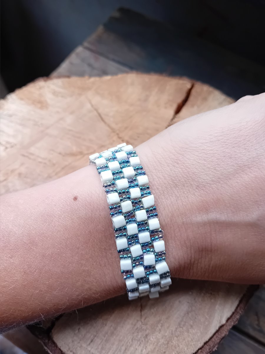 Shimmering blue and white cubes beaded bracelet cuff