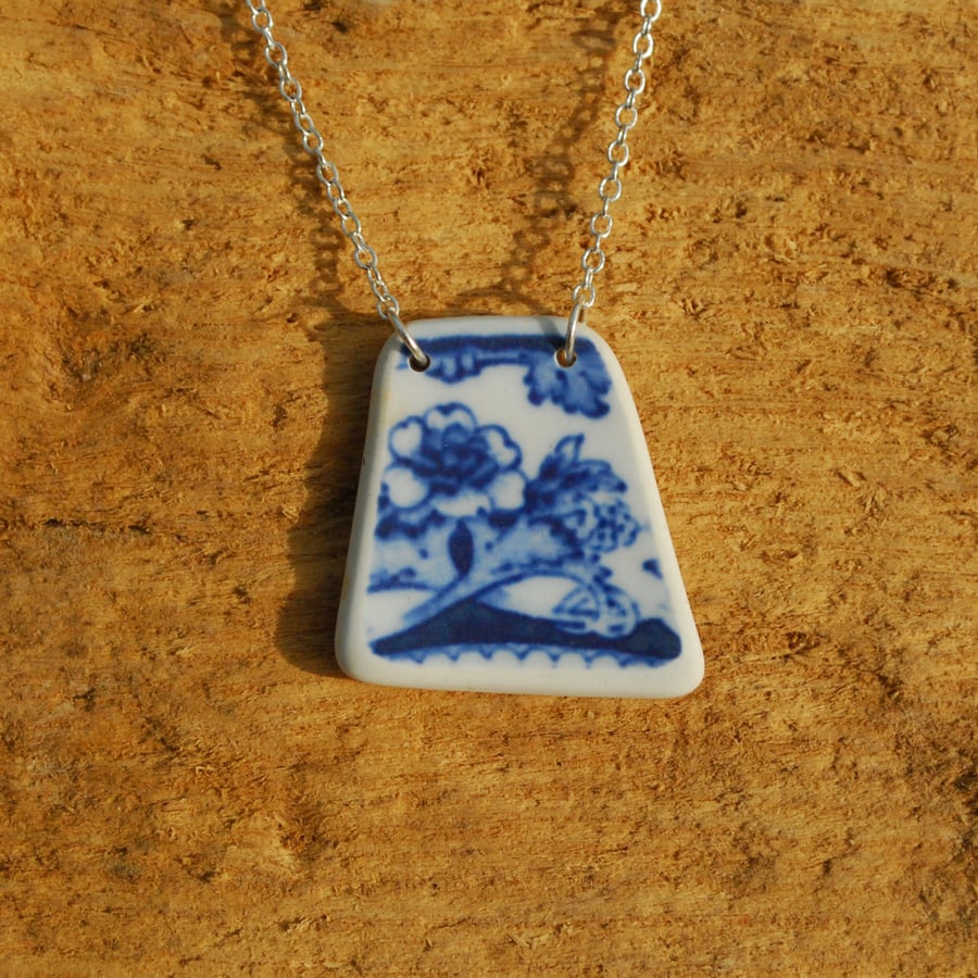 Beach pottery pendant with blue flowers