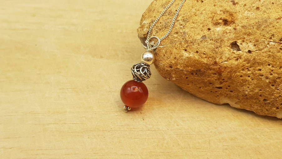 Minimalist Red Carnelian sphere pendant. July birthstone necklace