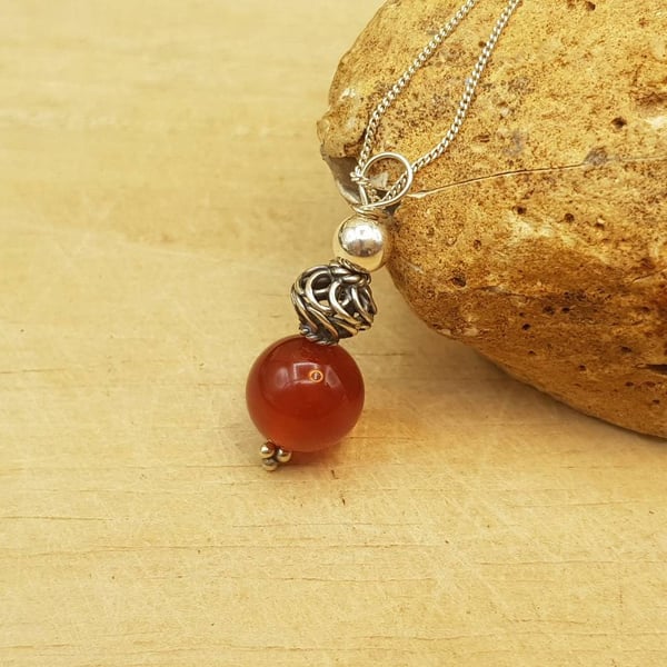 Minimalist Red Carnelian sphere pendant. July birthstone necklace