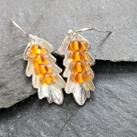 Leaf earrings in etched pewter with amber stones and sterling silver ear hooks