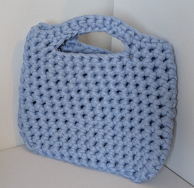 Handmade crochet bag made with light blue t-shirt yarn 