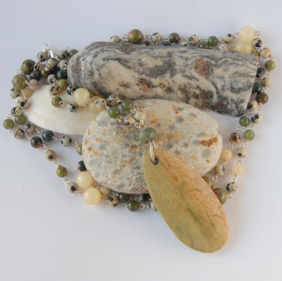 Long green and cream semi precious stone beaded necklace with jasper pendant