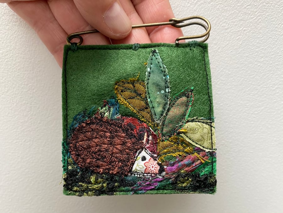 Upcycled hedgehog kilt pin brooch or badge. 