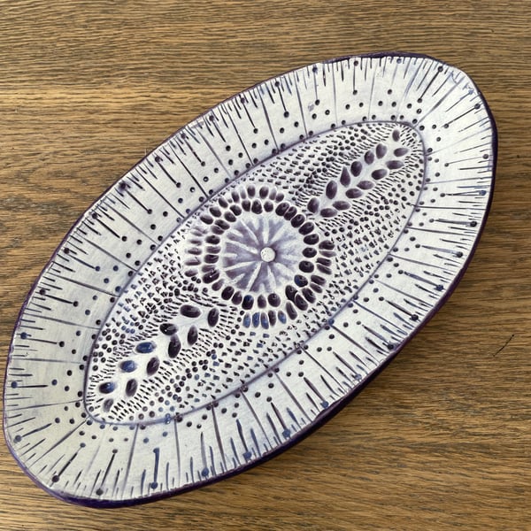Handmade oval purple textured ceramic trinket dish