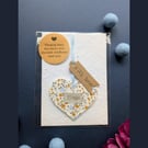 'Hugs' hanging heart decoration with plantable wildflower seed card