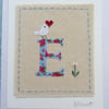 Letter E hand-stitched alphabet card