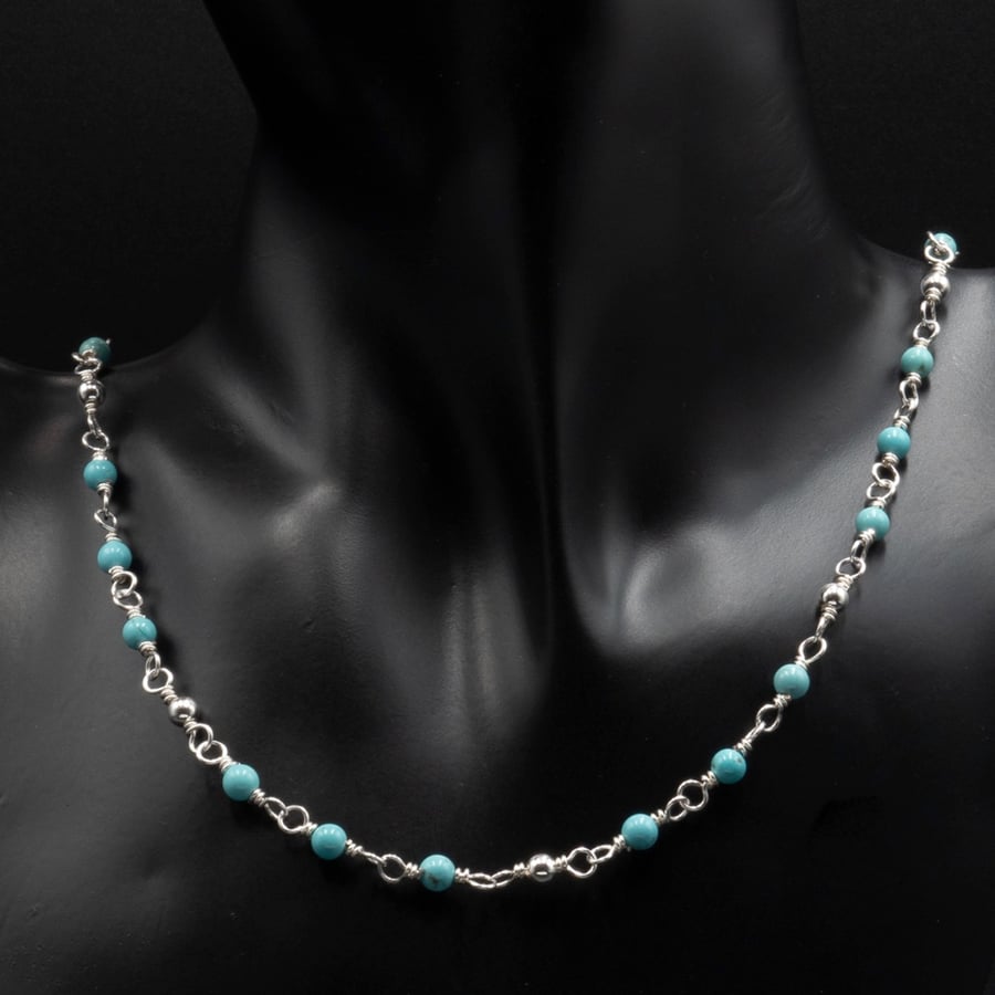 Turquoise Howlite and silver handmade link necklace.
