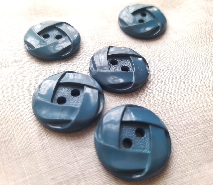Vintage blue 23mm buttons, with raised celtic knot design and 2 stitch holes