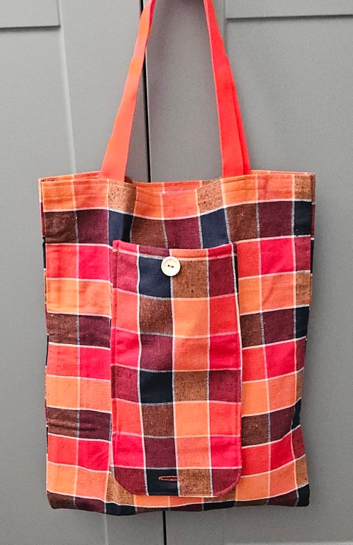 Bright chequed fold up tote bag.