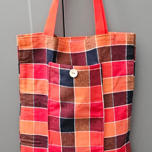 Bright chequed fold up tote bag.