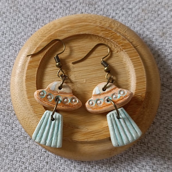 Cosmic flying saucer earrings 
