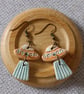 Cosmic flying saucer earrings 