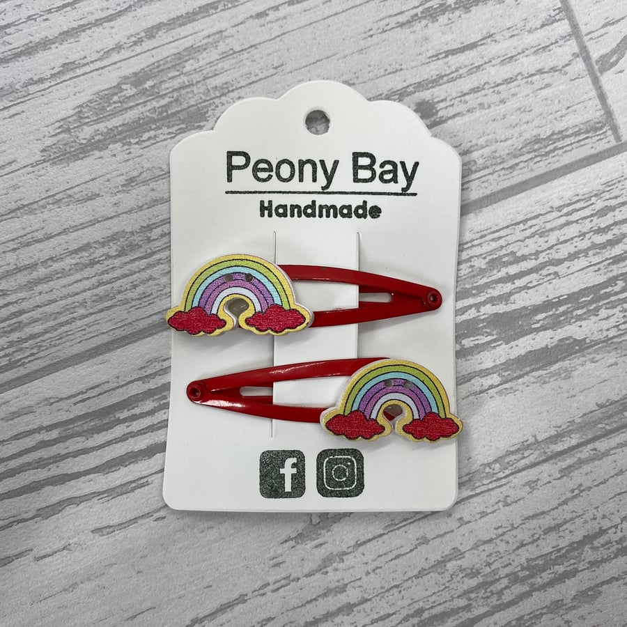 Girl’s rainbow hair clips in red
