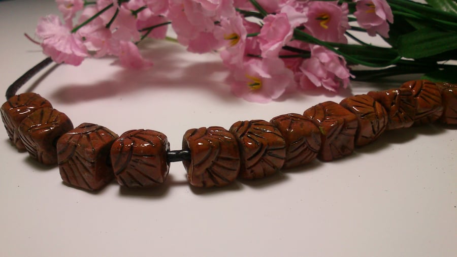 Leather brown ceramic beads