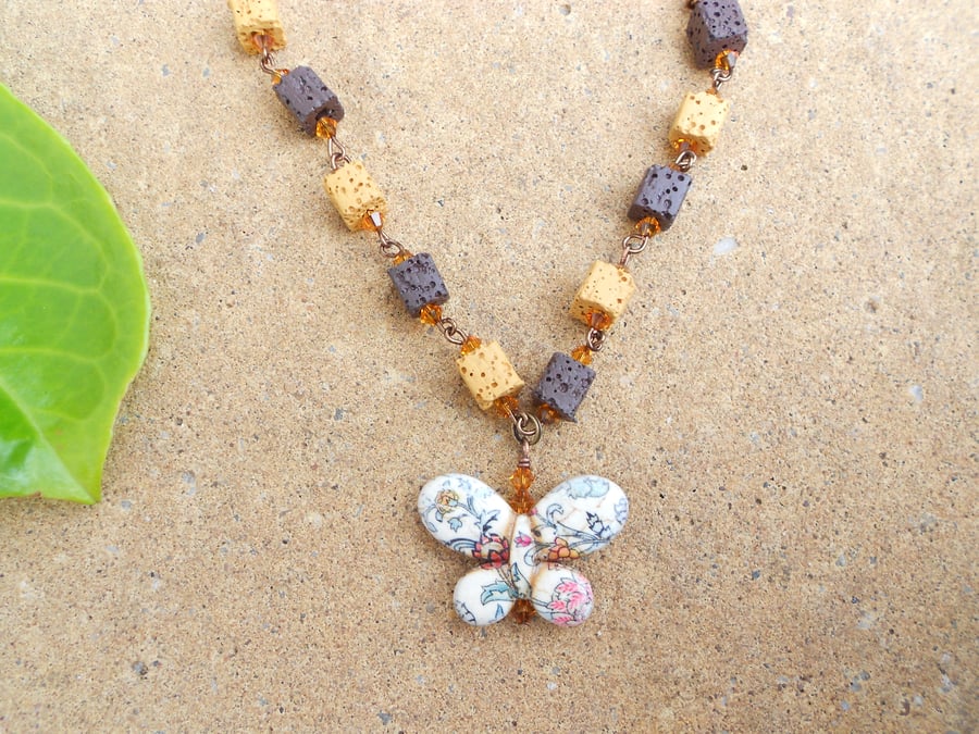 Sale!! was 10 pounds now 8.50 Howlite Butterfly and Lava Beads Necklace