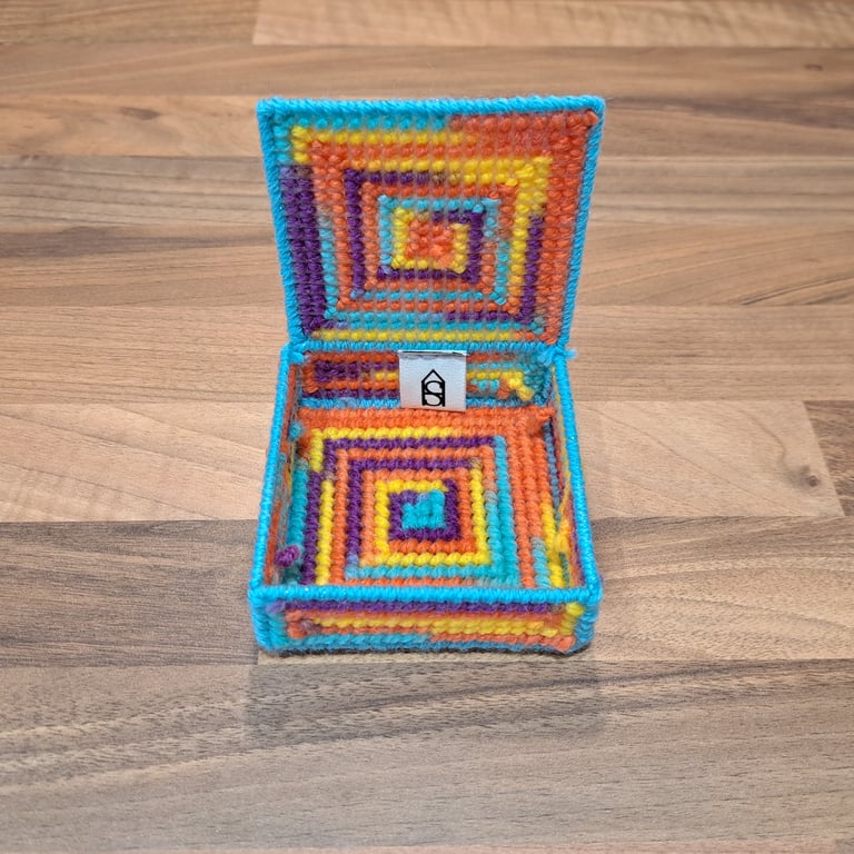 Container with lid for small desk items - blue, purple, yellow, orange mix 