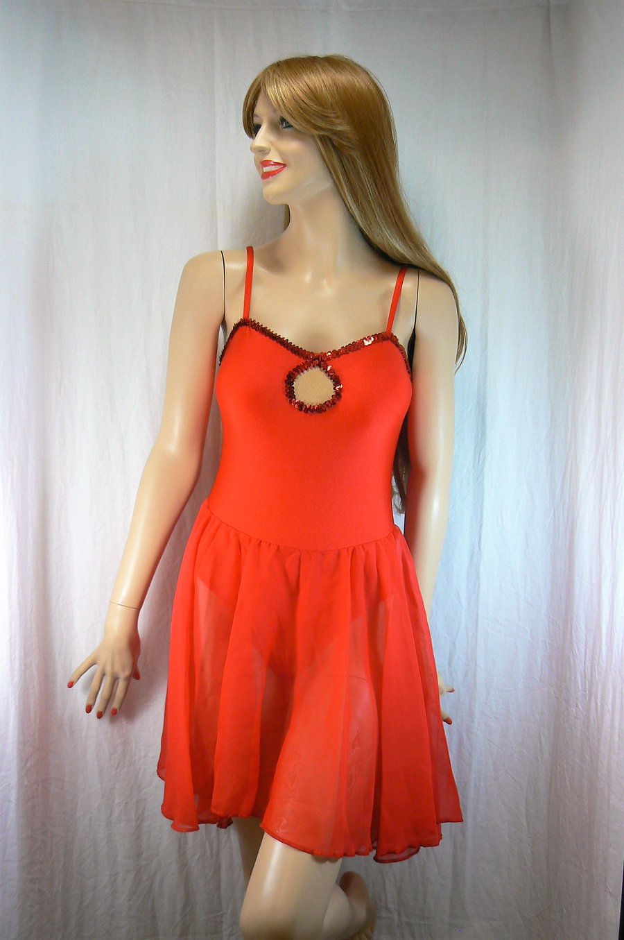 Red camisole dress with chiffon skirt and sequin trim