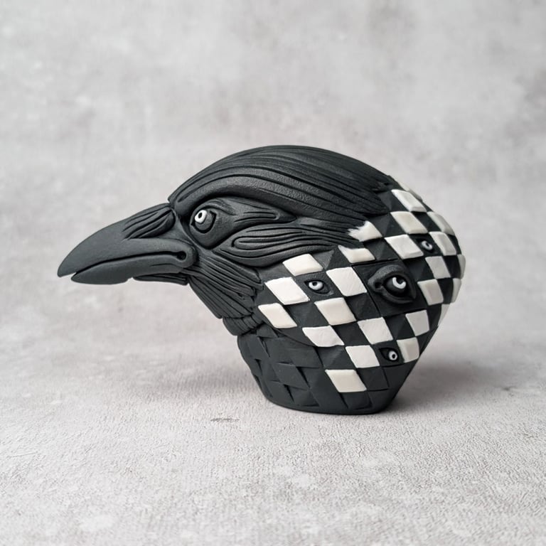 'Hailgrim', a black porcelain crow idol.