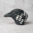 'Hailgrim', a black porcelain crow idol.