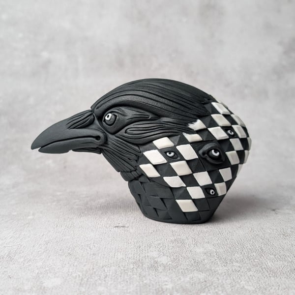 'Hailgrim', a black porcelain crow idol.