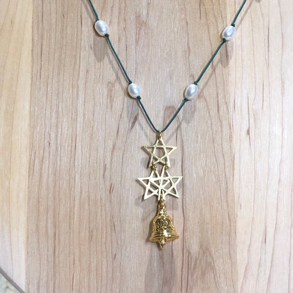 Triplet of Brass stars with delicate bell and Freshwater Pearls necklace