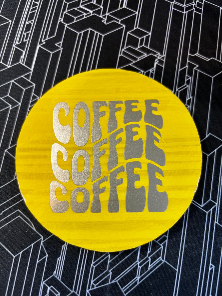 Bright yellow retro style coffee coaster