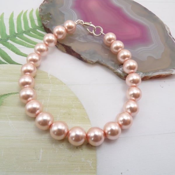 Peach Round Pearl beaded Silver Bracelet.