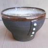 Tea Bowl, black clay, white glaze.