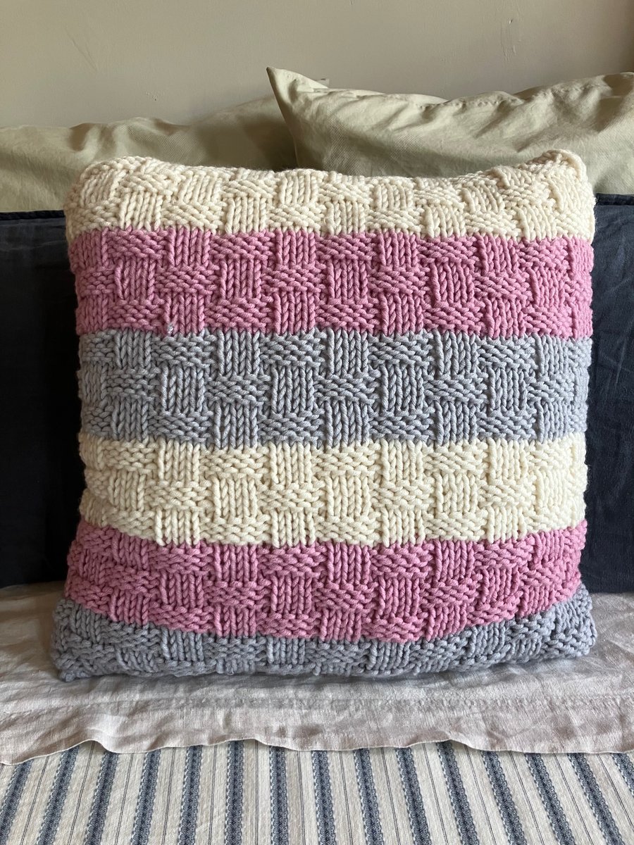 Brand-new hand-knitted cushion cover with feather cushion included