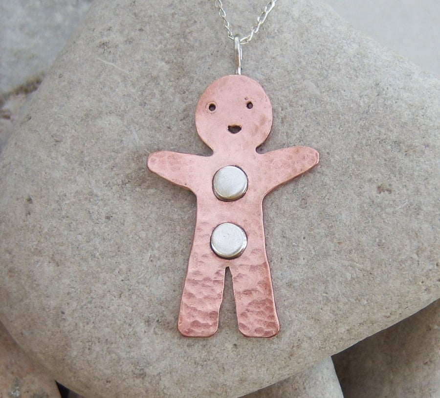 Gingerbread man pendant in copper and sterling silver