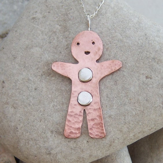 Gingerbread man pendant in copper and sterling silver