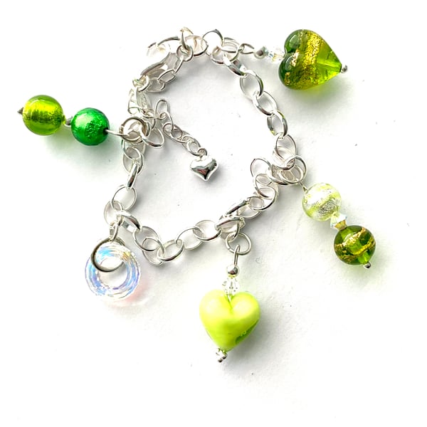 Sterling silver and  Murano glass charm bracelet with Swarovski.