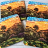 Moorland sunset scene with tree coaster or drinks mat. 