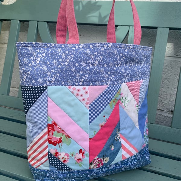 Pink and blue patchwork quilted tote bag