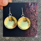 Brass bowl dangle earrings with sterling silver hooks.